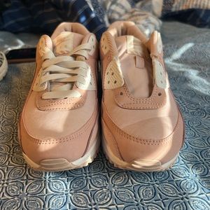 Pink Nike’s barley worn